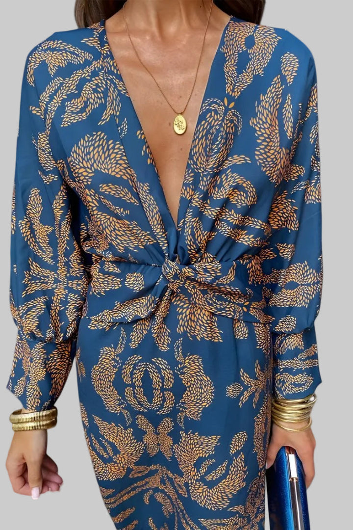 Ema - Robe Maxi avec Décolleté en V et Nœud Frontale